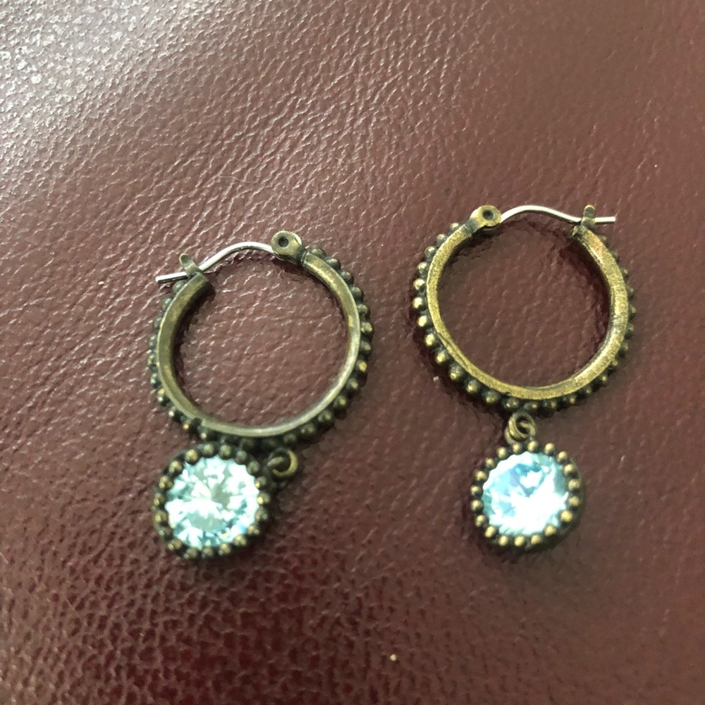 Costume hoop earring with dangling blue stone